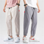 Darío, Pantalón de algodón con bajo ajustable, colores caqui y gris, comparativa frontal