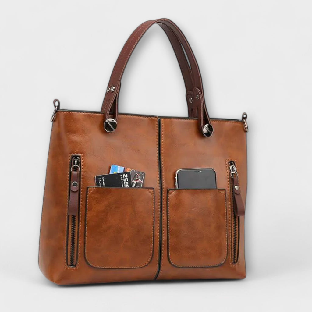 Casilda | Bolso de mano en piel con silueta depurada