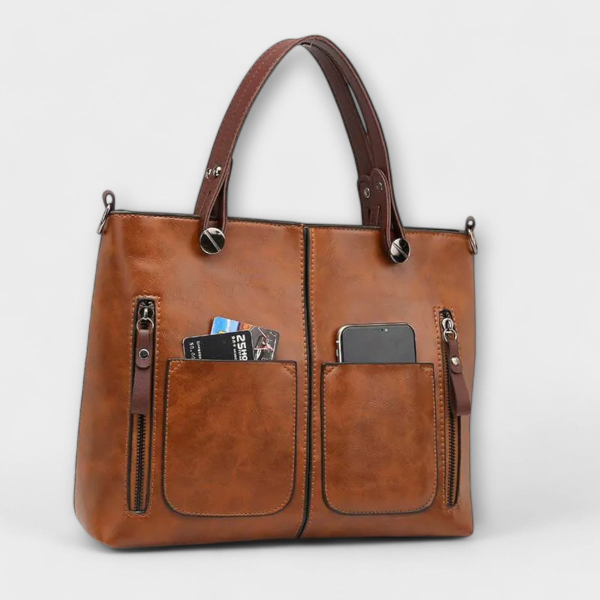 Casilda | Bolso de mano en piel con silueta depurada