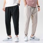 Darío, Pantalón de algodón con bajo ajustable, colores negro y caqui, comparativa frontal