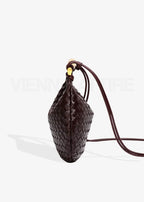 Malena | Bolso trenzado con asa dorada