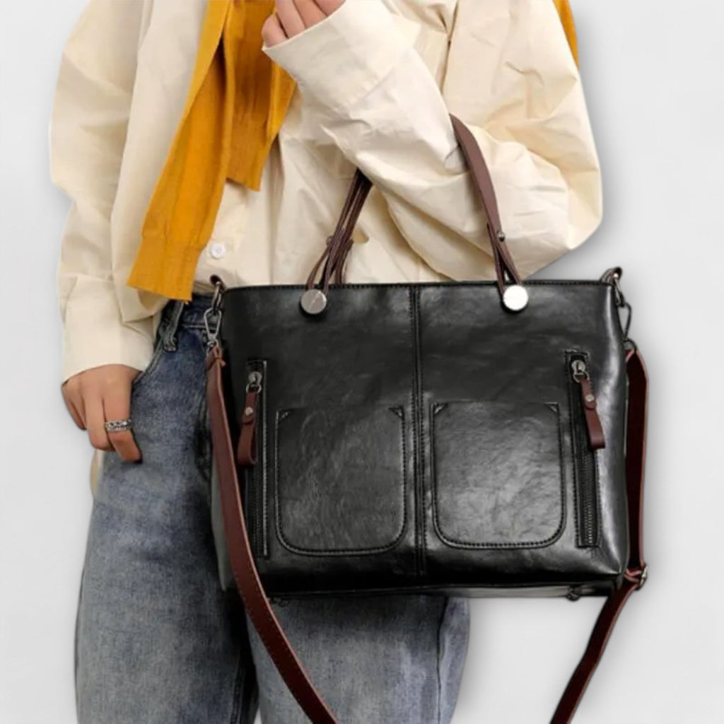 Casilda | Bolso de mano en piel con silueta depurada