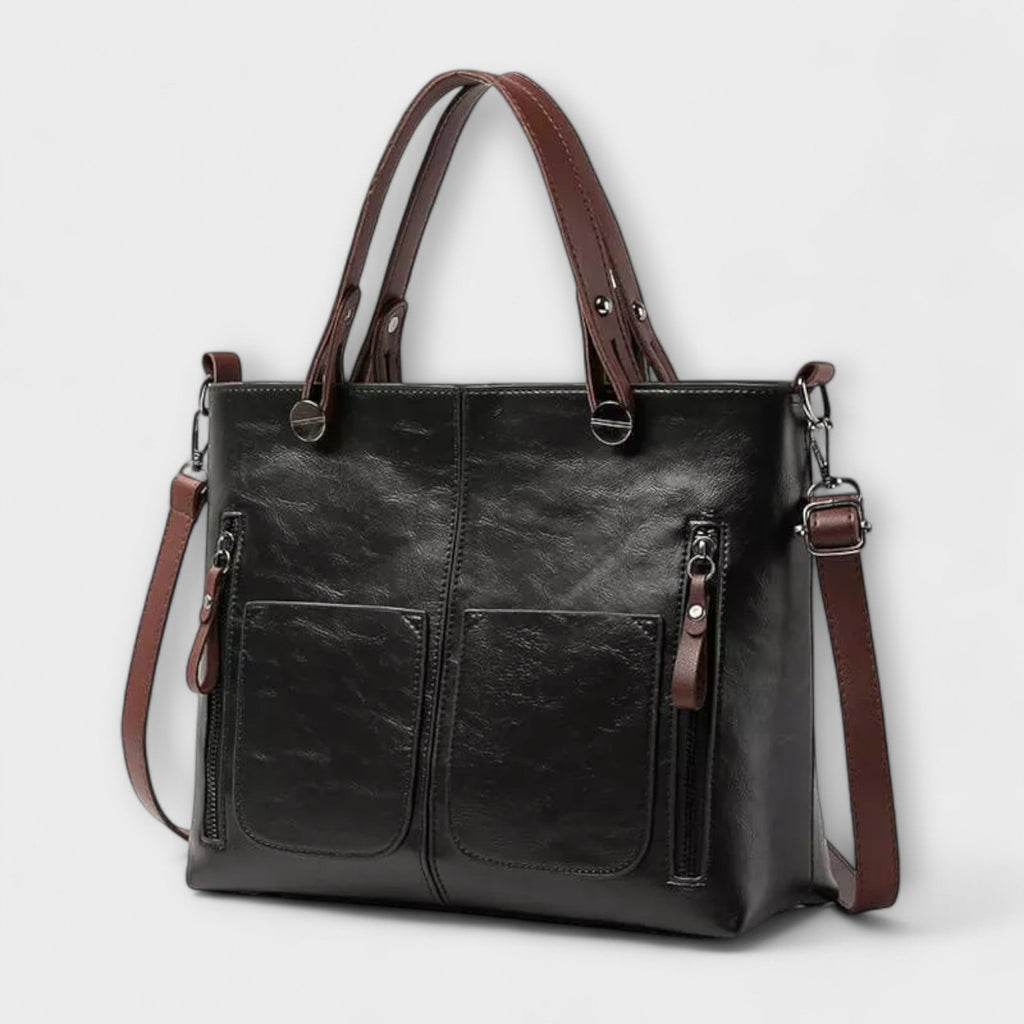 Casilda | Bolso de mano en piel con silueta depurada