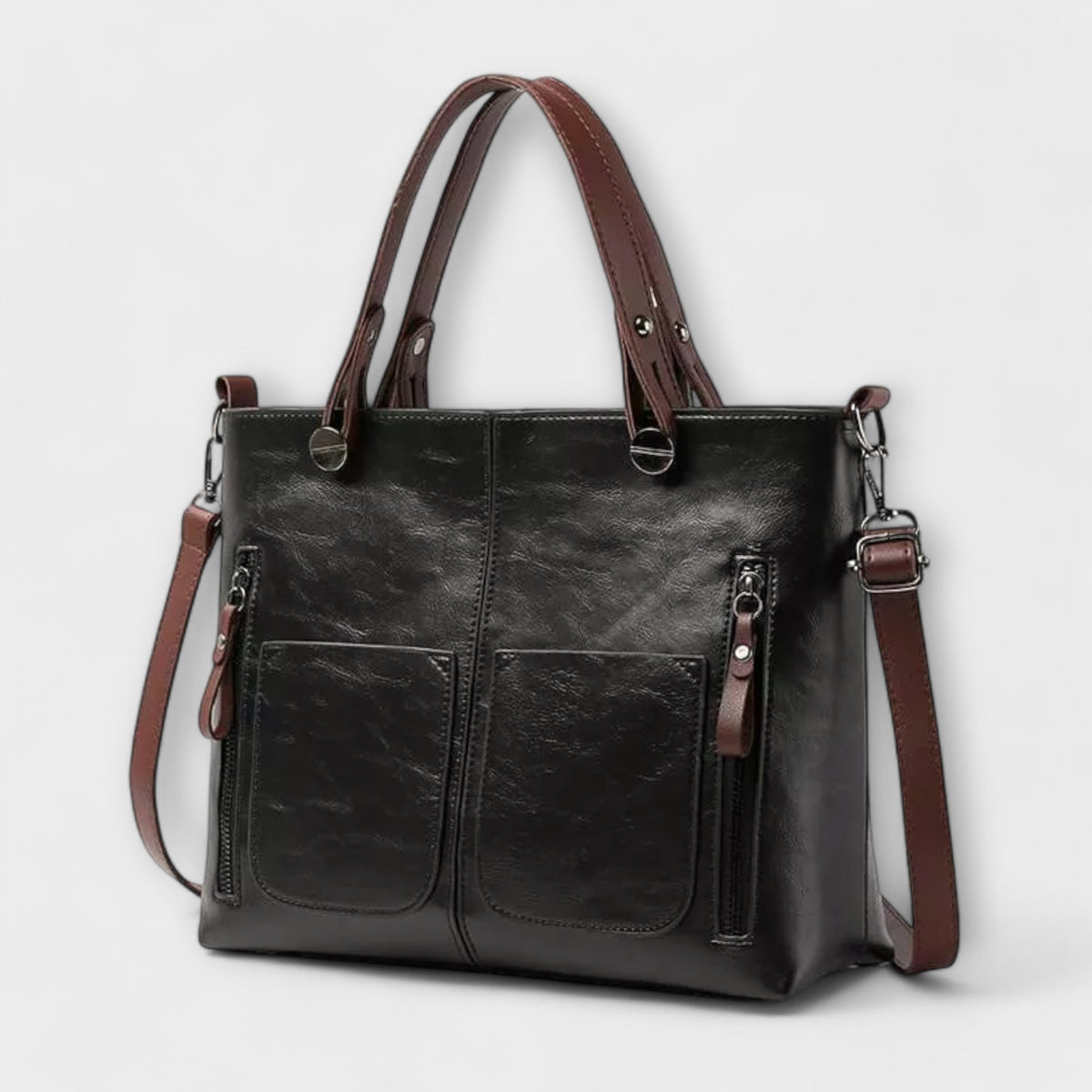 Casilda | Bolso de mano en piel con silueta depurada