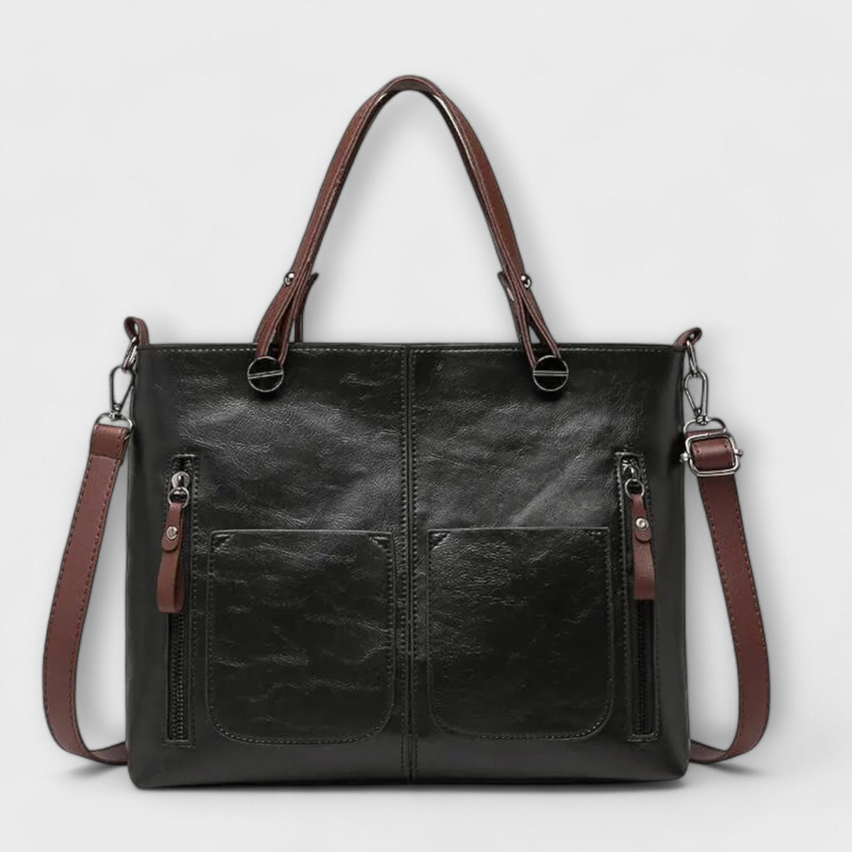 Casilda | Bolso de mano en piel con silueta depurada