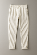 Simón, Pantalón de lino con cintura de cordón, color blanco roto, vista frontal en plano, vista principal
