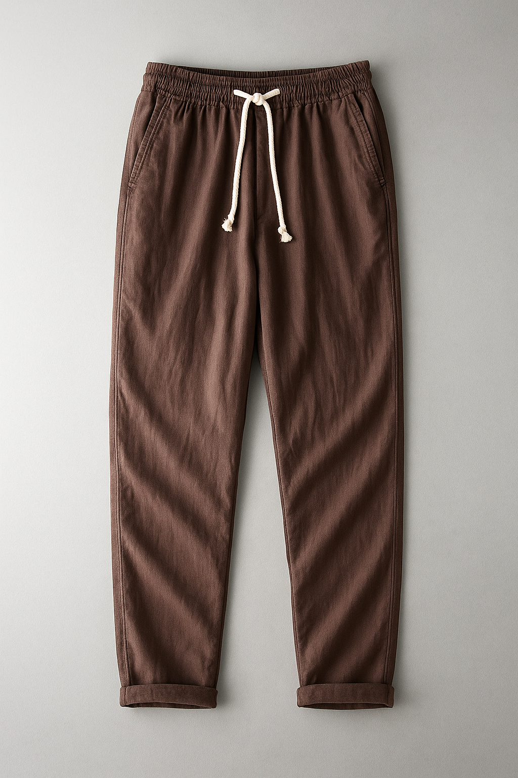 Simón, Pantalón de lino con cintura de cordón, color marrón, vista frontal en plano, vista alternativa
