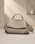 Coral | Bolso satchel con pliegues esculpidos