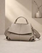 Coral | Bolso satchel con pliegues esculpidos