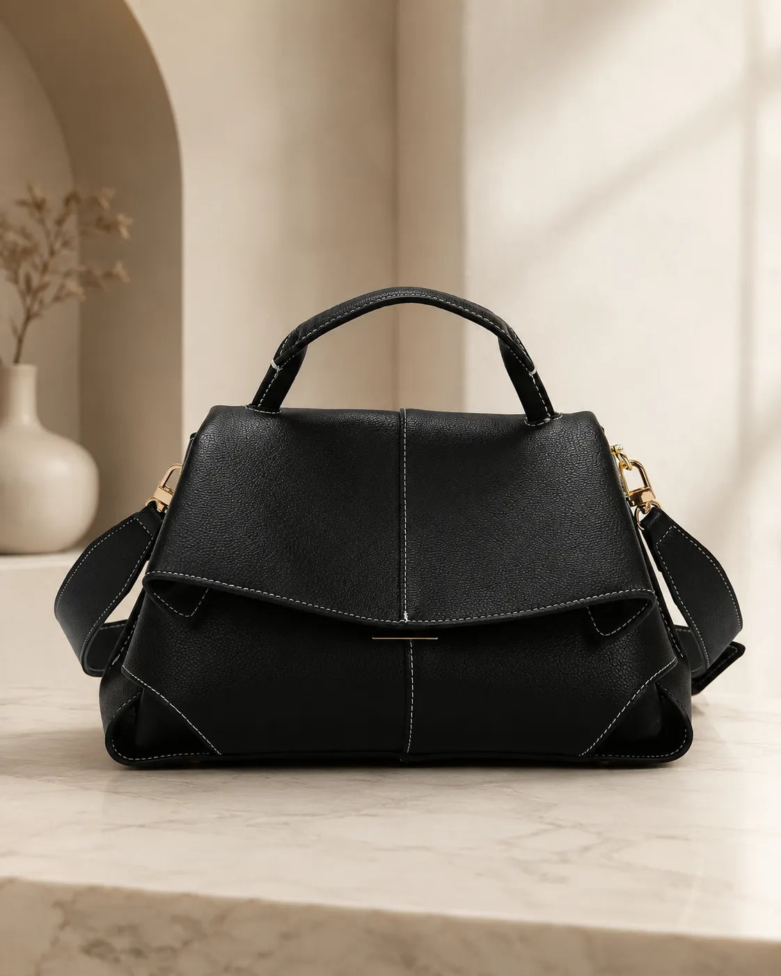 Coral | Bolso satchel con pliegues esculpidos
