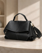 Coral | Bolso satchel con pliegues esculpidos