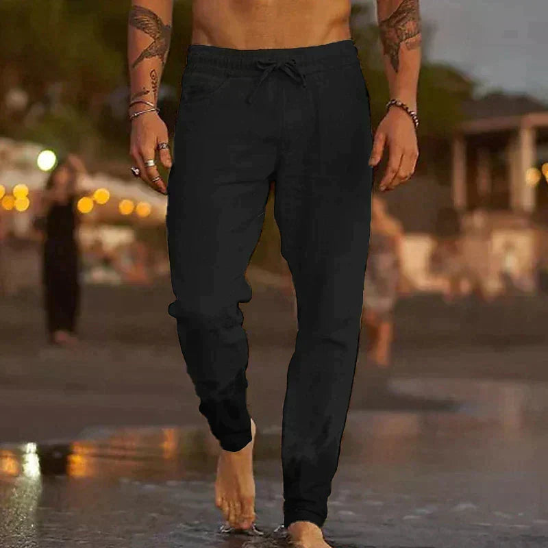 Fermín, Pantalón de lino de corte cónico, color negro, vista frontal, detalle del diseño
