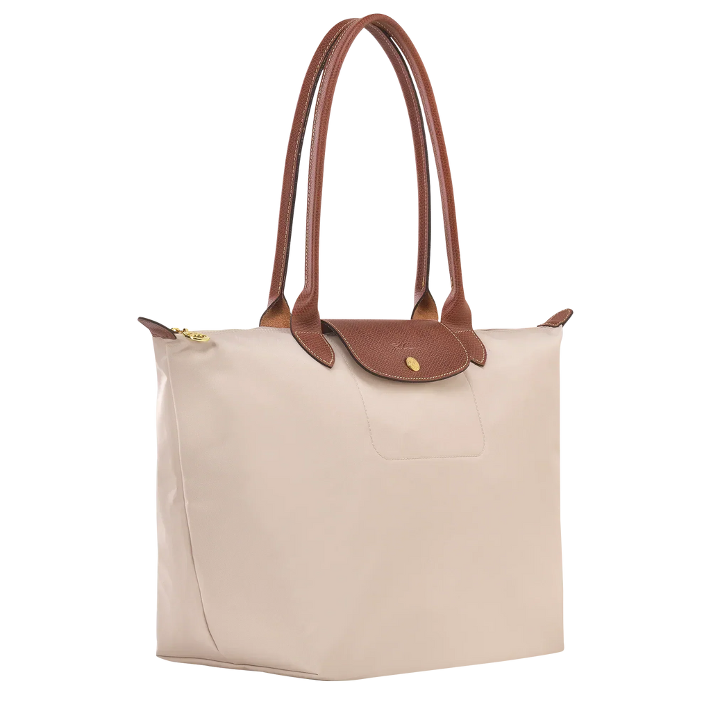 Bolso Grande Premium, Papel