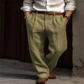 Alonso, Pantalón de lino con pinzas, color verde oliva, vista frontal con cinturón