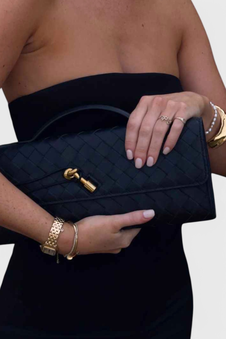 Edurne | Bolso de mano con detalle de lazo dorado