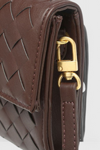Edurne | Bolso de mano con detalle de lazo dorado