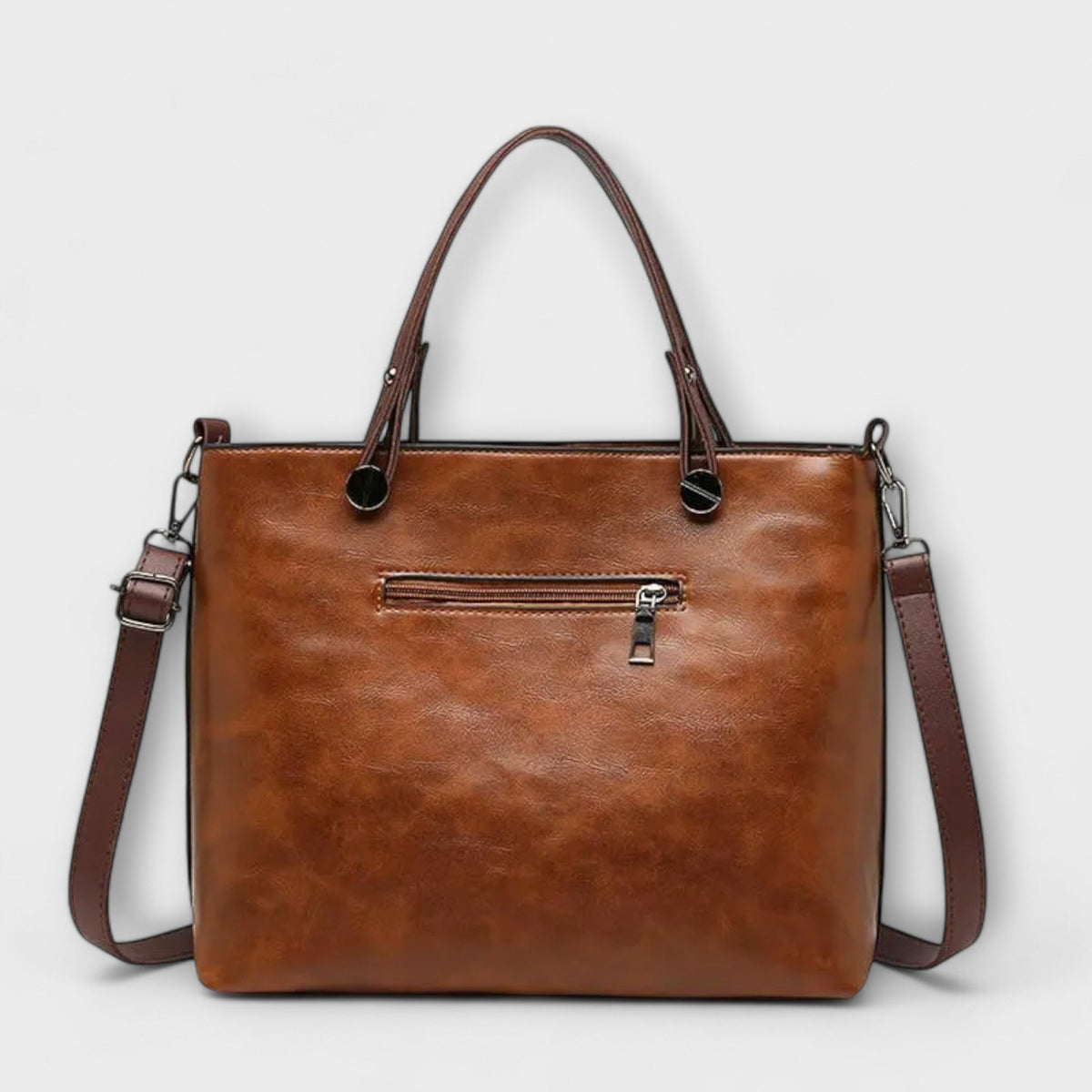 Casilda | Bolso de mano en piel con silueta depurada