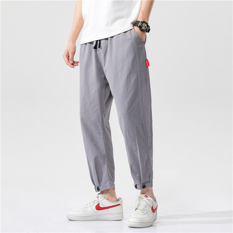 Darío, Pantalón de algodón con bajo ajustable, color gris, vista tres cuartos