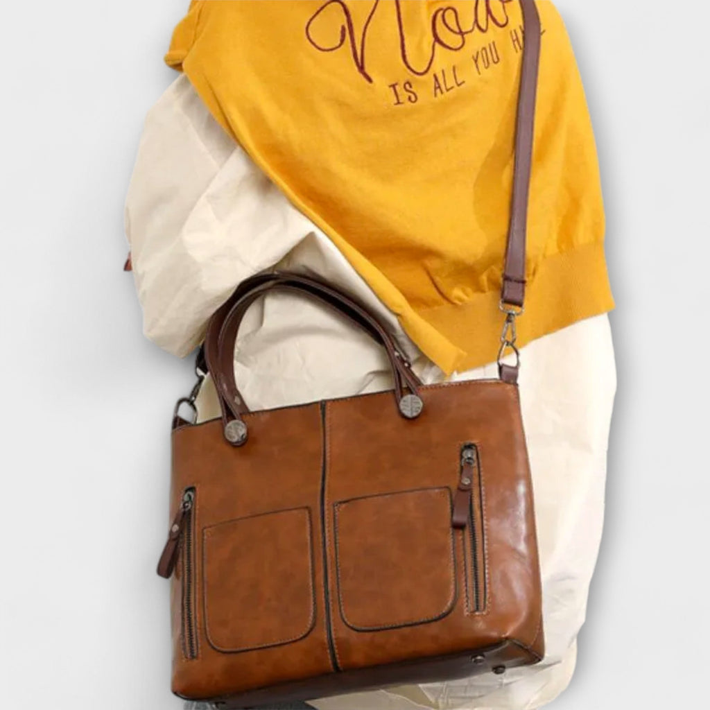 Casilda | Bolso de mano en piel con silueta depurada